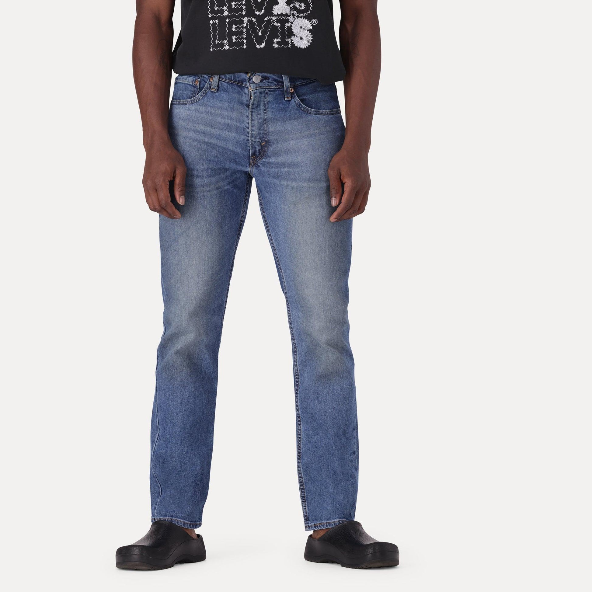 511™ SLIM FIT JEANS - MED INDIGO - WORN IN