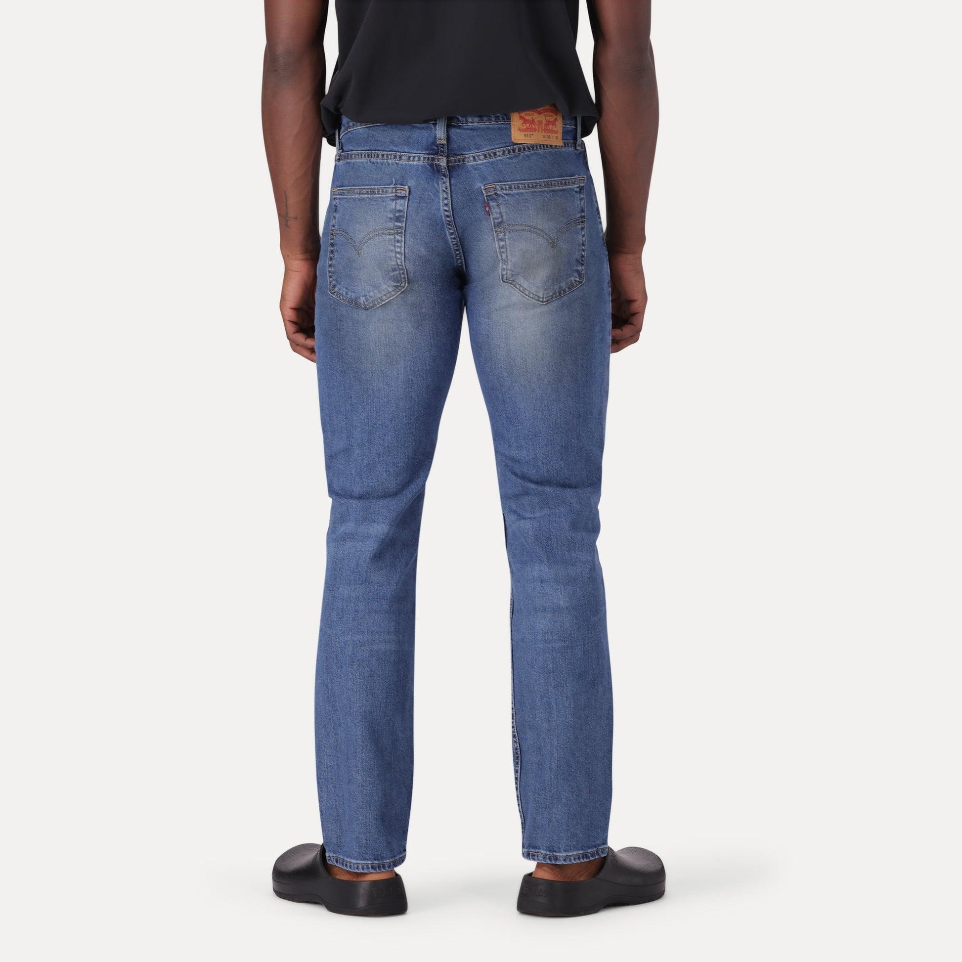 511™ SLIM FIT JEANS - MED INDIGO - WORN IN