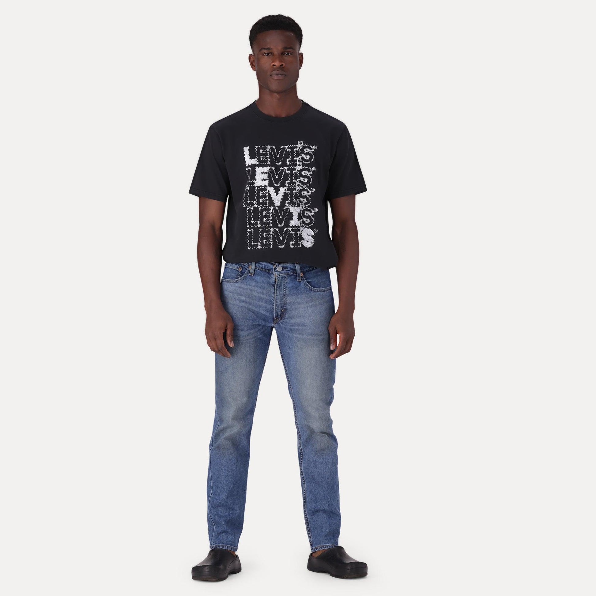 511™ SLIM FIT JEANS - MED INDIGO - WORN IN