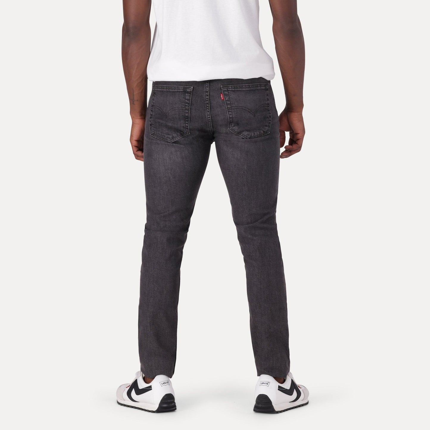 SKINNY TAPER FIT JEANS - BLACK