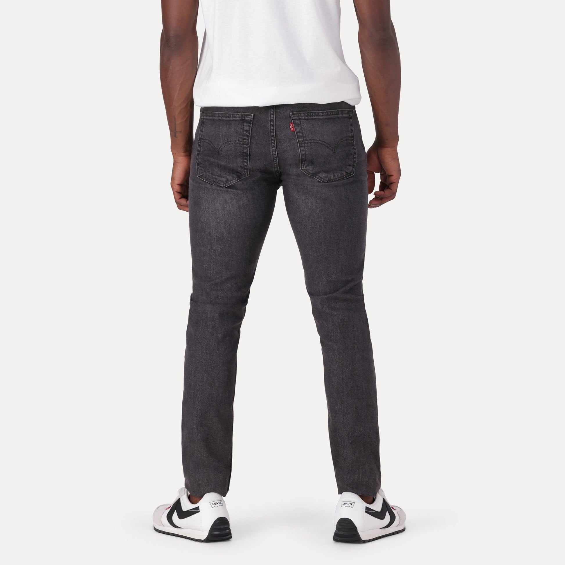 SKINNY TAPER FIT JEANS - BLACK