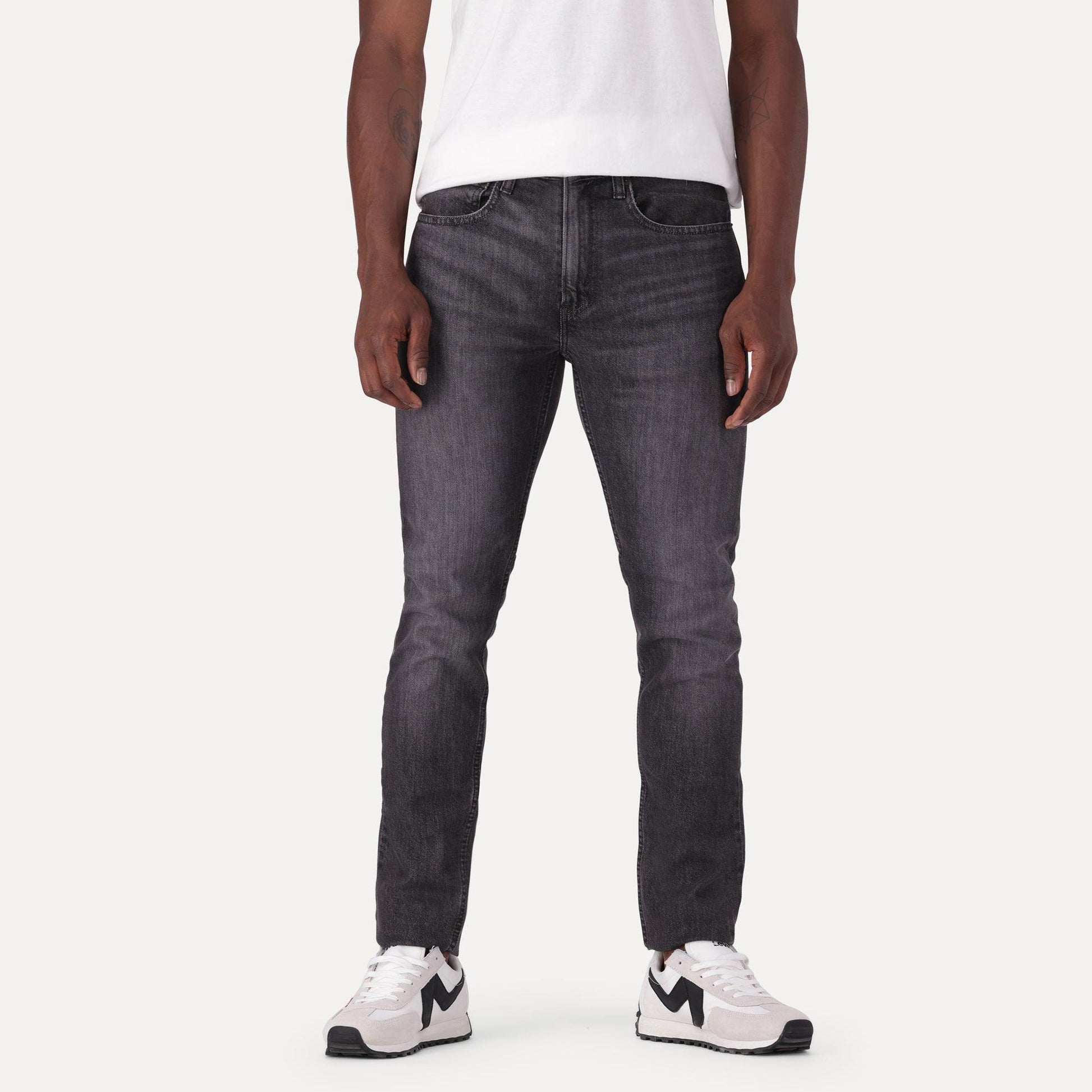 SKINNY TAPER FIT JEANS - BLACK